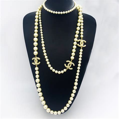 classic chanel logo necklace|Chanel pearl necklace price list.